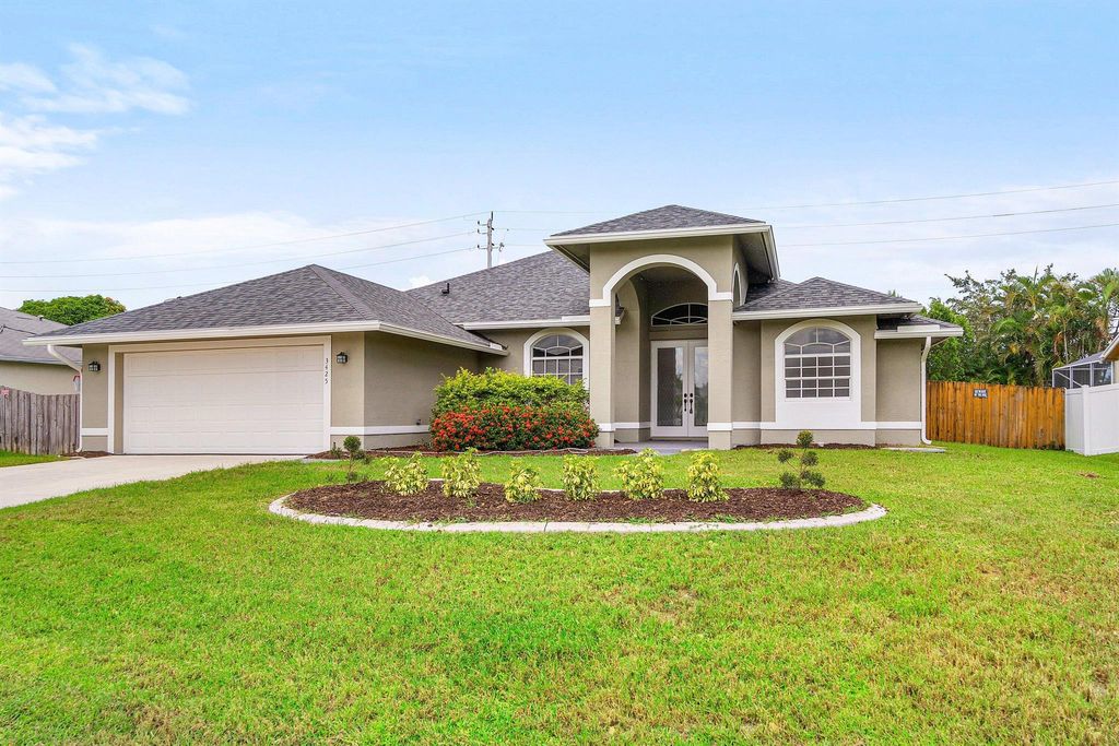 Photo of 3425 SE Bevil Avenue, Port Saint Lucie, FL 34984 (MLS # R11120630)
