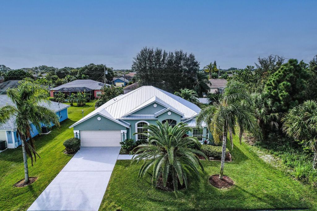 Photo of 430 SW Dahled Avenue, Port Saint Lucie, FL 34953 (MLS # R10932275)