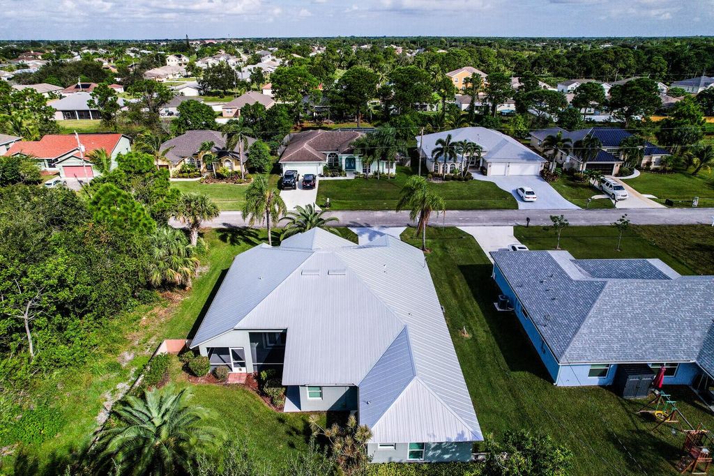 Photo of 430 SW Dahled Avenue, Port Saint Lucie, FL 34953 (MLS # R10932275)