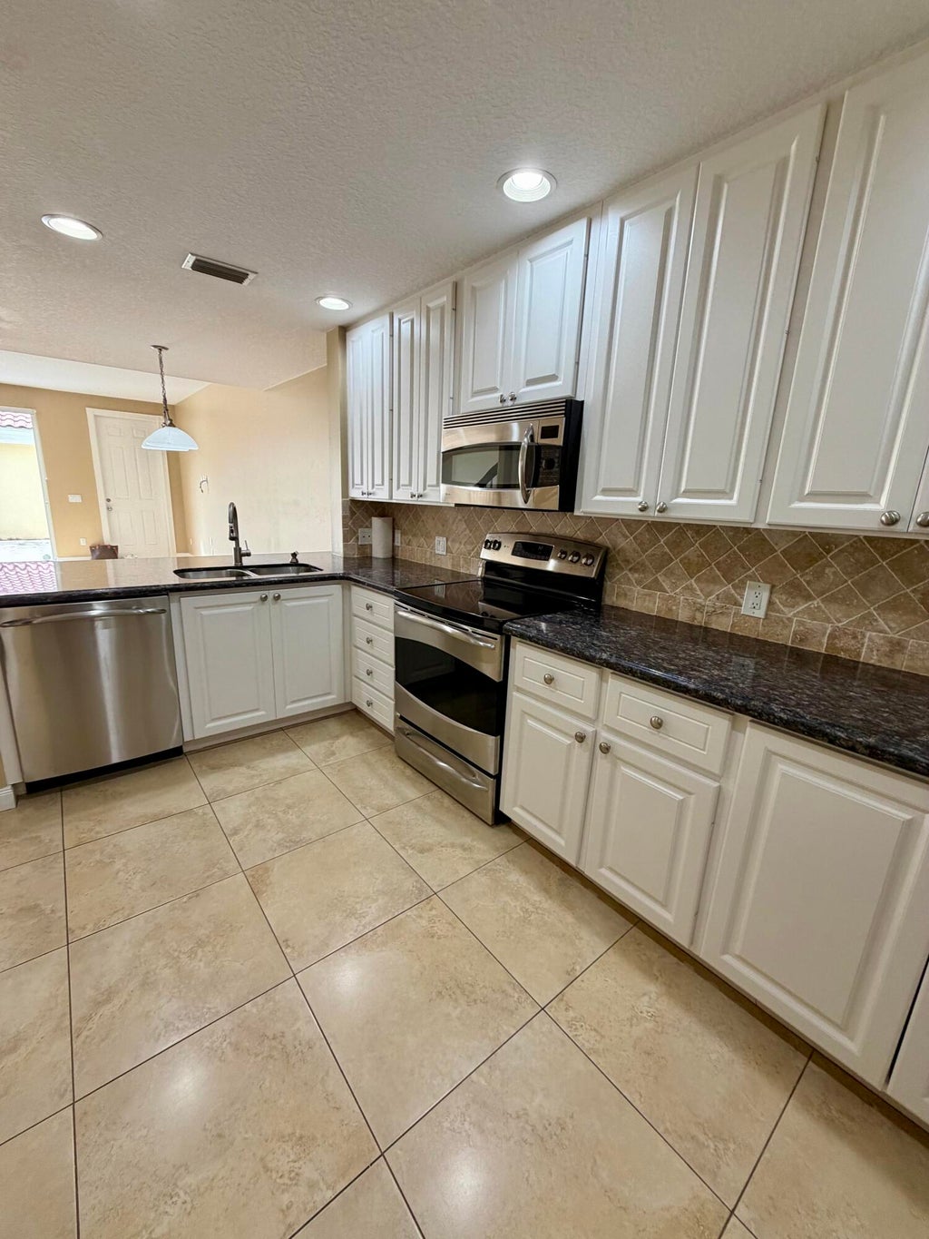Photo of 1605 Jeaga Drive, Jupiter, FL 33458 (MLS # B26051401)