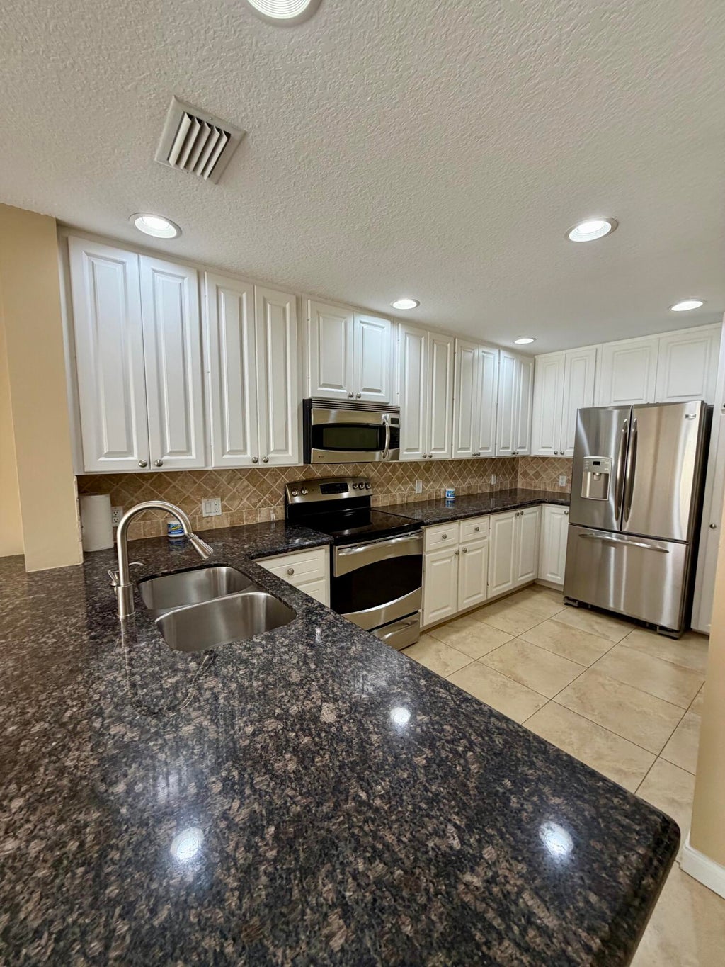 Photo of 1605 Jeaga Drive, Jupiter, FL 33458 (MLS # B26051401)