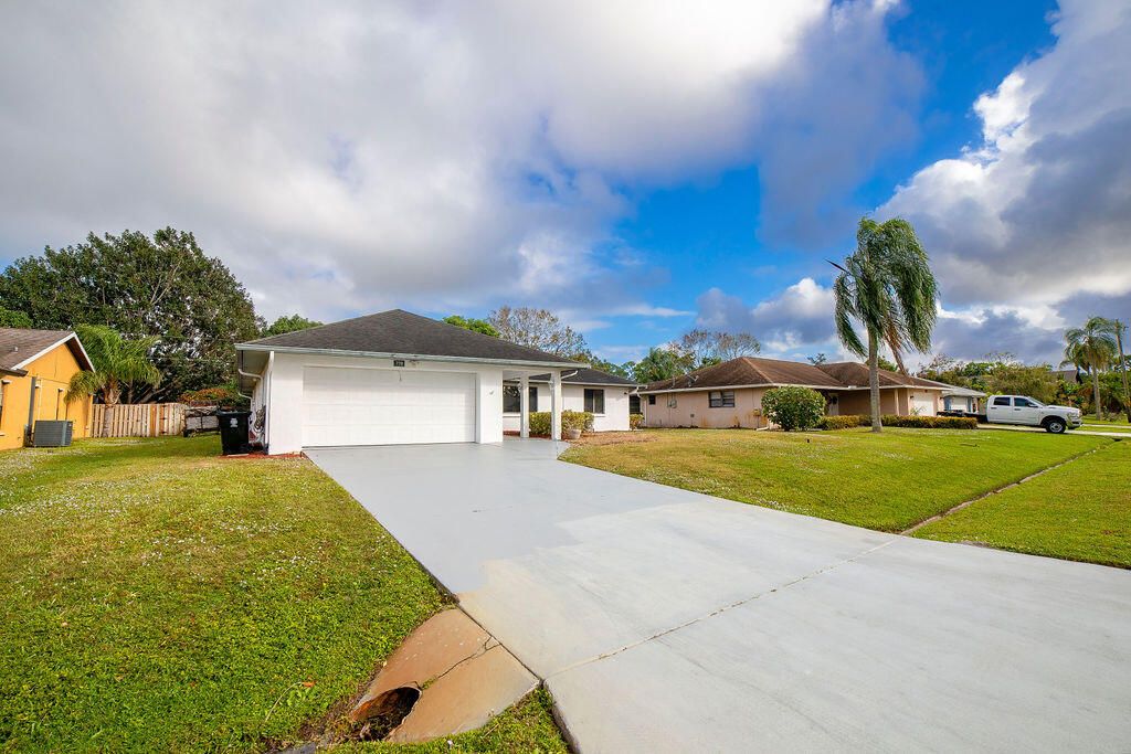 Photo of 779 SE Forgal Street, Port Saint Lucie, FL 34983 (MLS # R11046187)