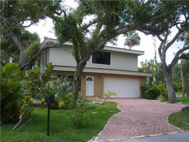 Investor dream! Charming Spanish style house. Conveniently located east of A1A in Central Beach. Walk to the beach (7th house from ocean) & hear the waves at night. Walk to Boardwalk, Parks, Village Shops, Dining, Marina, & Theater. Over 3,000 sq ft plus a 1,000sq balcony. No HOA Private well for sprinkler system. Zoned AC, Water heater, newer septic.