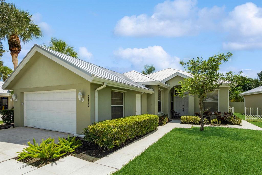 Photo of 2973 SW Brighton Way, Palm City, FL 34990 (MLS # R10912323)