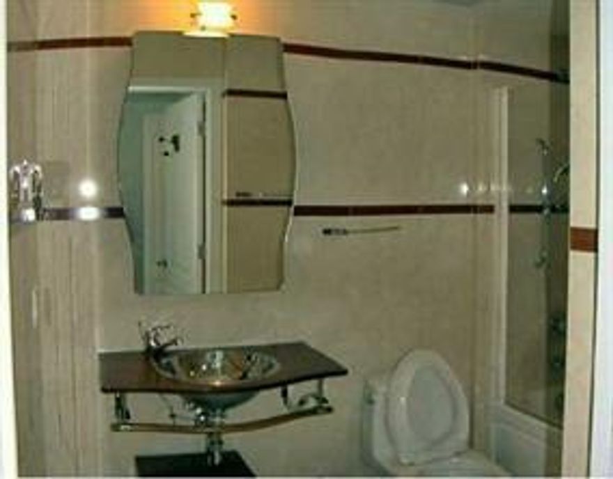 SOUTH OF FIFTH. 2 BEDROOM 2 BATH CONDO WITH BEAUTIFUL PARTIAL OCEAN VIEW. BAMBOO FLOORING, EUROPEAN KITCHEN, GRANITE COUNTERTOPS, STAINLESS STEEL APPLIANCES. MARBLE IN BATHROOMS. ALL CALIFORNIA CLOSETS, AND BLINDS. FULL stackable WASHER AND DRYER IN UNIT. The Cosmopolitan is a secure, full amenity building featuring 24/7 security, a pool, gym, and clubroom.  WALK TO THE BEACH AND SoBe ATTRACTIONS. Please use Showingtime, 24 hrs notice; tenants occupied. Available April 15, 2026.