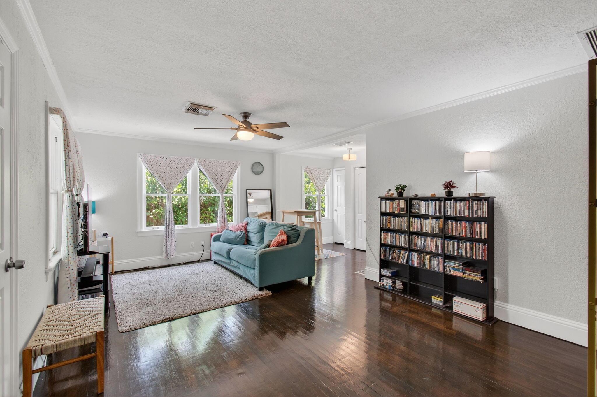 NO HOA!! Step into timeless character blended with modern upgrades in this beautifully maintained 2-bed, 1-bath home. Original refinished hardwood floors set the tone for a warm & inviting atmosphere. The fully renovated bathroom adds a fresh, contemporary touch. The kitchen features granite countertops, under-cabinet lighting, a modern tile backsplash, and top-of-the-line stainless steel appliances. Outside, enjoy Florida living at its finest on the tiled back patio, overlooking a botanical, fully fenced yard. There's ample space for entertaining, gardening, or room for a pool. The large shed offers extra storage. Off-street parking adds convenience, and with no HOA, you'll enjoy freedom and flexibility.