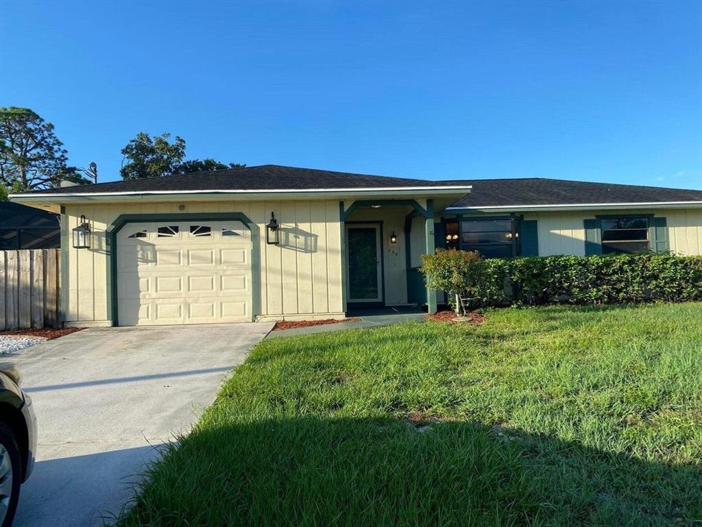 Photo of 338 SW Lucero Drive Dr, Port Saint Lucie, FL 34983 (MLS # R10826253)