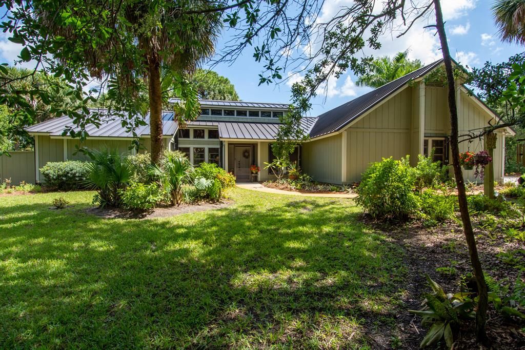 Photo of 855 NE Stokes Terrace, Jensen Beach, FL 34957 (MLS # R10723725)