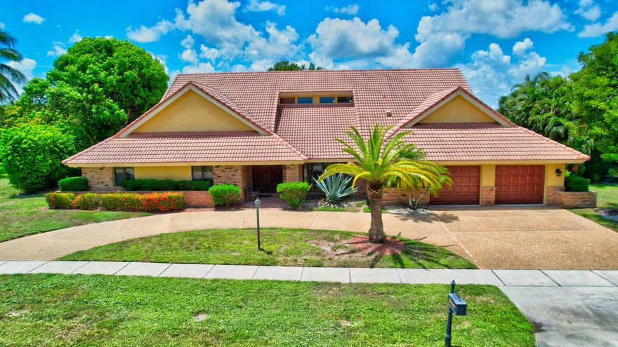 NOW INCLUDES NEW White Impact Windows and Doors! Enjoy perfect Southwest backyard Lake exposure-afternoon sun/amazing sunsets from your pool! Spacious 3952 square feet under air. Plenty of room to expand. 4 Bedrooms 3 1/2 baths including his/hers master bath suite. Central location in Woodfield Hunt Club, a gated community with attended guard gates and 24/7 roving patrol. Across the street from Saint Andrews School. Cathedral ceilings in Living room and master bedroom. 21'x13' Loft above kitchen. Double sided old brick fireplace. Circular driveway. Community has tennis + basketball courts, a gym and a party room. No club membership required. Option to join Woodfield Country Club if desired. Seller is a Florida licensed Real Estate agent. Measurements are approximate and not warranted.