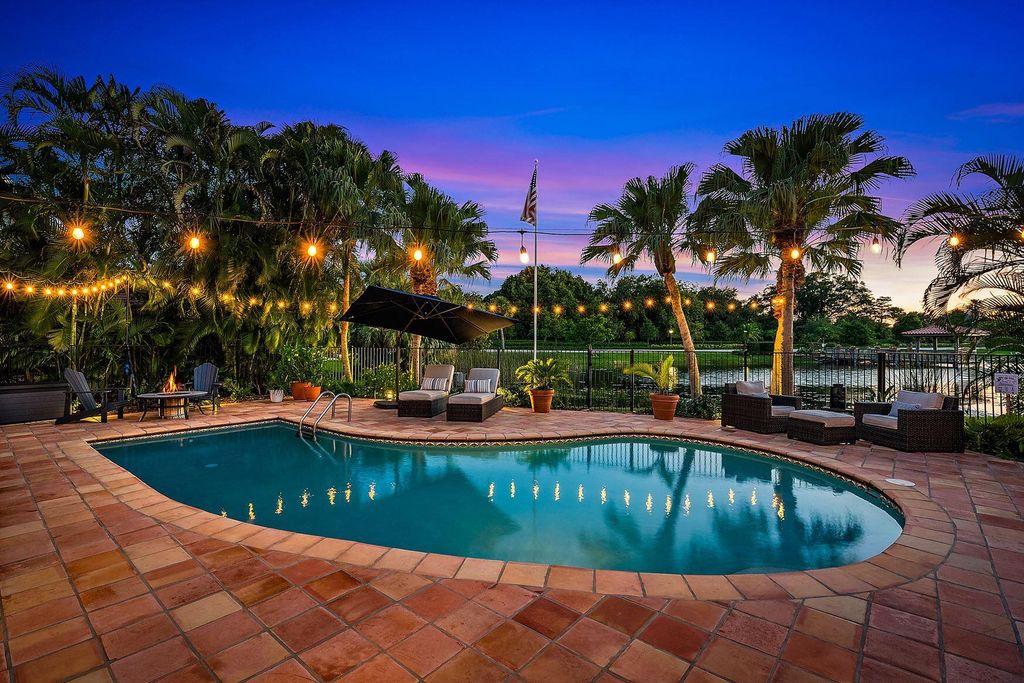 Photo of 12907 N Normandy Way, Palm Beach Gardens, FL 33410 (MLS # R10886969)