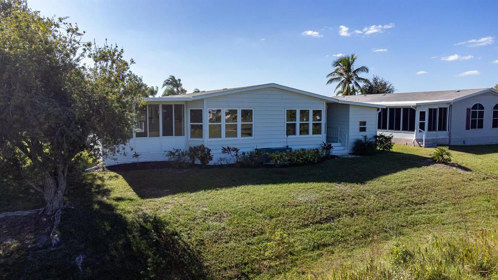 Photo of 3049 Satinleaf Lane, Port Saint Lucie, FL 34952 (MLS # R10758063)