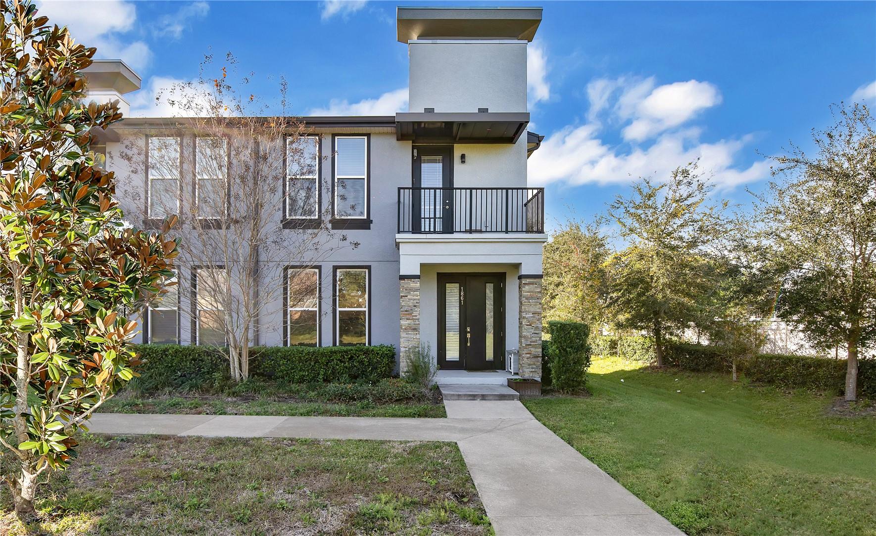 Priced to sell! This contemporary end-unit townhome in Kissimmee, FL offers modern style & convenience. The home features a sleek kitchen w/ ample cabinet space, granite countertops, & a large island-perfect for both cooking & entertaining. The open-concept living area is bright and inviting, complete with/ window treatments. Upstairs, the spacious bedrooms include a primary suite w/ a walk-in closet, stylish bathroom, & a private balcony. Additional highlights include modern bathrooms, an in-unit washer & dryer, & a two-car garage. The HOA provides excellent value, covering access to the community pool, exterior maintenance (including roof), cable TV, internet/Wi-Fi, lawn care, & trash removal. SoHo at Lakeside is conveniently located near Orlando Int'l Airport & the Lake Nona area.