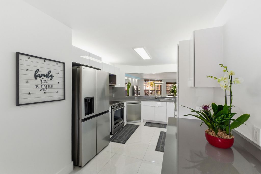 Photo of 7524 Granville Dr #201, Tamarac, FL 33321 (MLS # B26000560)