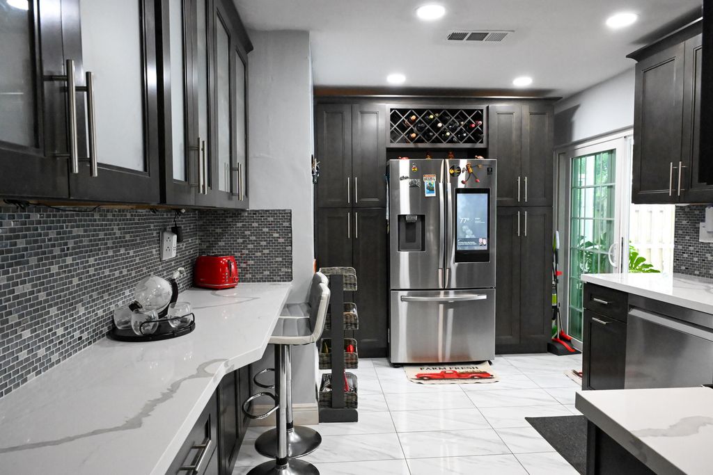 Photo of 8610 NW 27th Place, Sunrise, FL 33322 (MLS # B26010928)