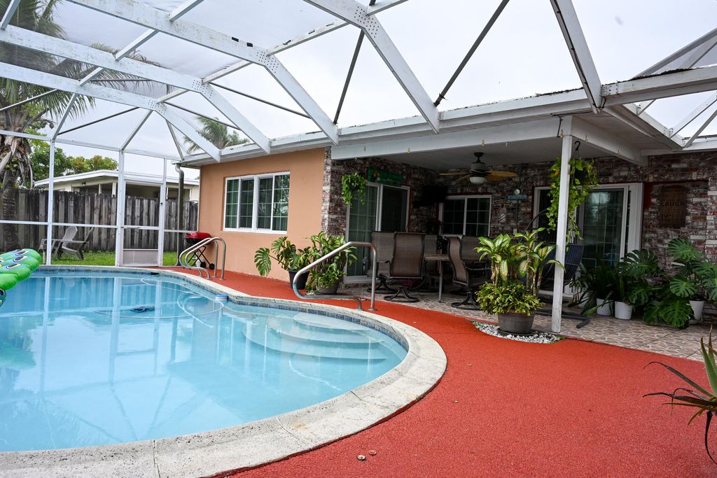 Photo of 8610 NW 27th Place, Sunrise, FL 33322 (MLS # B26010928)