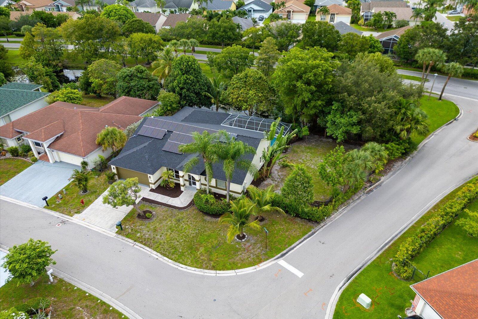 Showings must be scheduled with Showingtime. Stunning 3/2.5 pool home remodeled in 2025 with gorgeous kitchen and bathrooms! Minutes from town and beaches. Completely move in ready. Offering new Calacatta quartz kitchen with soft close shaker cabinets and high end finishes, spa like tile bathroom with high end vanity and free standing tub, waterproof laminate floors, fresh paint in and out, Brand new appliances, new fixtures and landscaping. Easy access to i95 and shopping. Move in ready condition, you wont need to lift a finger. Low HOA!! Come relax in this gorgeous home and live your Florida Dream! Sewer, 2025 Roof, 2019 AC, 2022 Water heater, Pool in great condition, Solar panels low electrical bill!