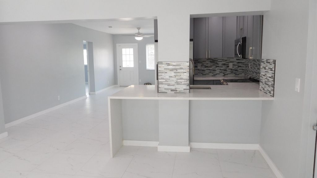 Photo of 258 NE 22nd Street, Delray Beach, FL 33444 (MLS # R10997426)