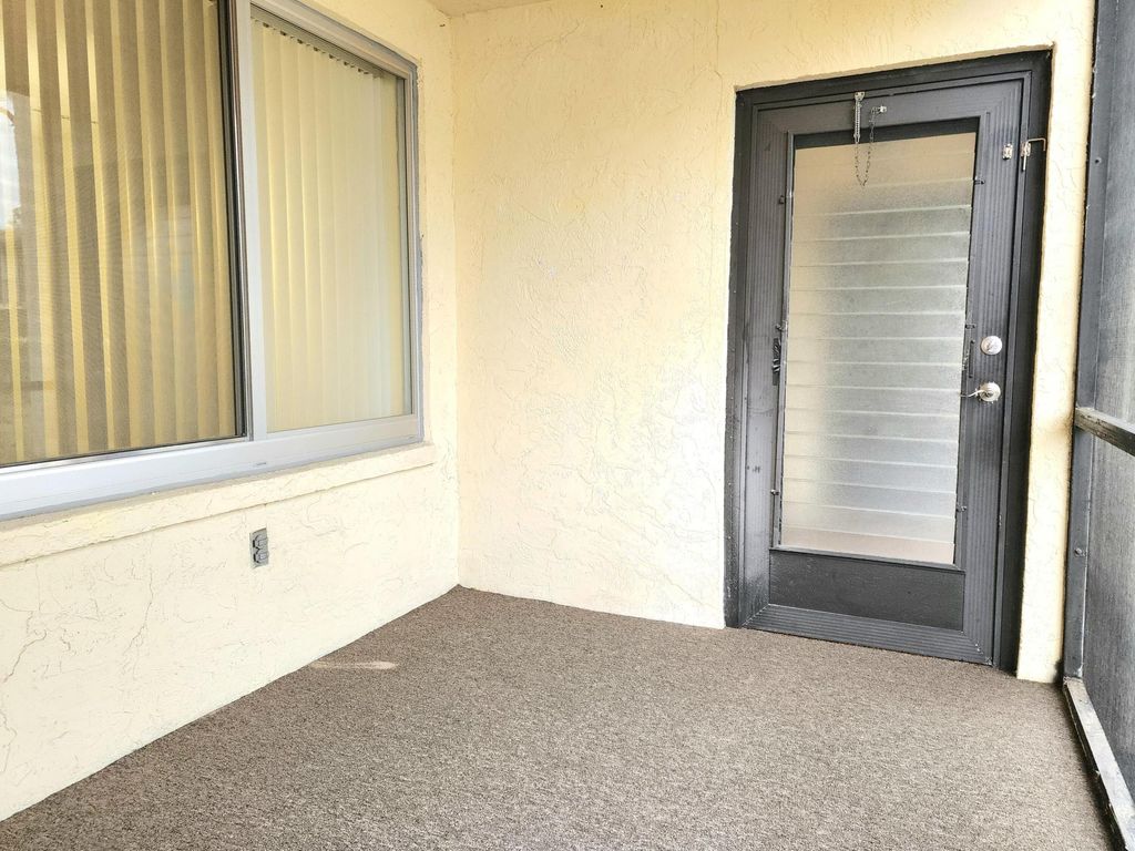 Photo of 126 Lake Pine Circle #A-1, Greenacres, FL 33463 (MLS # R11104872)