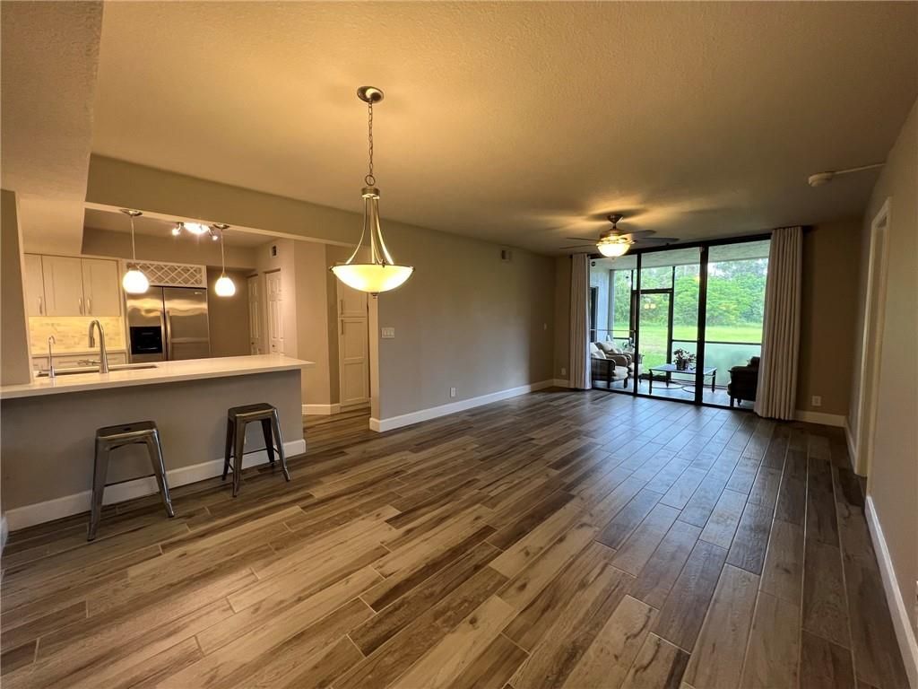 Photo of 5661 Riverside Dr Dr #105, Coral Springs, FL 33067 (MLS # F10343923)