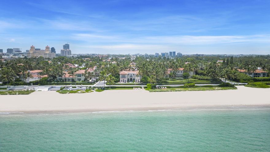 There are only 23 ocean front single family homes ''in town'' on the Island of Palm Beach.  There is only ONE available for purchase.  Welcome home! 240 North Ocean Blvd is a spectacular oceanfront estate available on the island of Palm Beach in an A+ center of town location. This rare find is one of a few properties with a deeded private beach parcel directly on the sand. Spanning 100 feet, the private beach parcel offers exclusive access to the pristine sands and Atlantic Ocean sapphire blue water. The home's elegant floor plan is designed around the stunning views, with communal areas overlooking the pool and ocean. Two primary suites face the ocean, while two guest suites share a sun deck to the West.