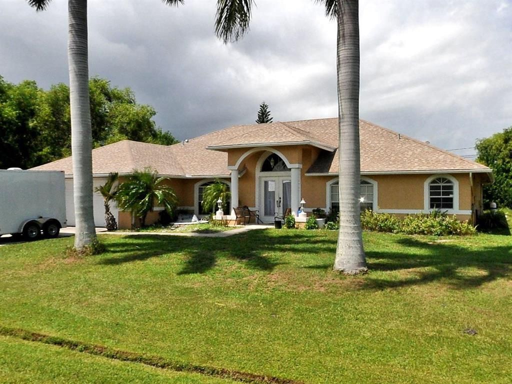 Photo of 2843 SE Melaleuca Boulevard, Port Saint Lucie, FL 34952 (MLS # R10736150)