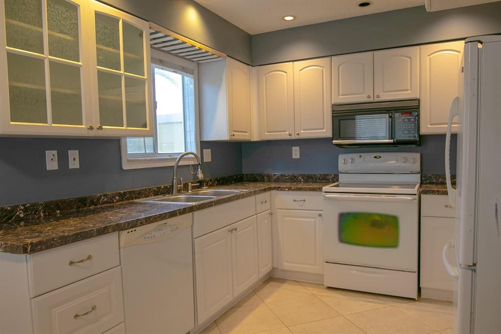 Photo of 6222 Riverwalk Lane #8, Jupiter, FL 33458 (MLS # R10727882)