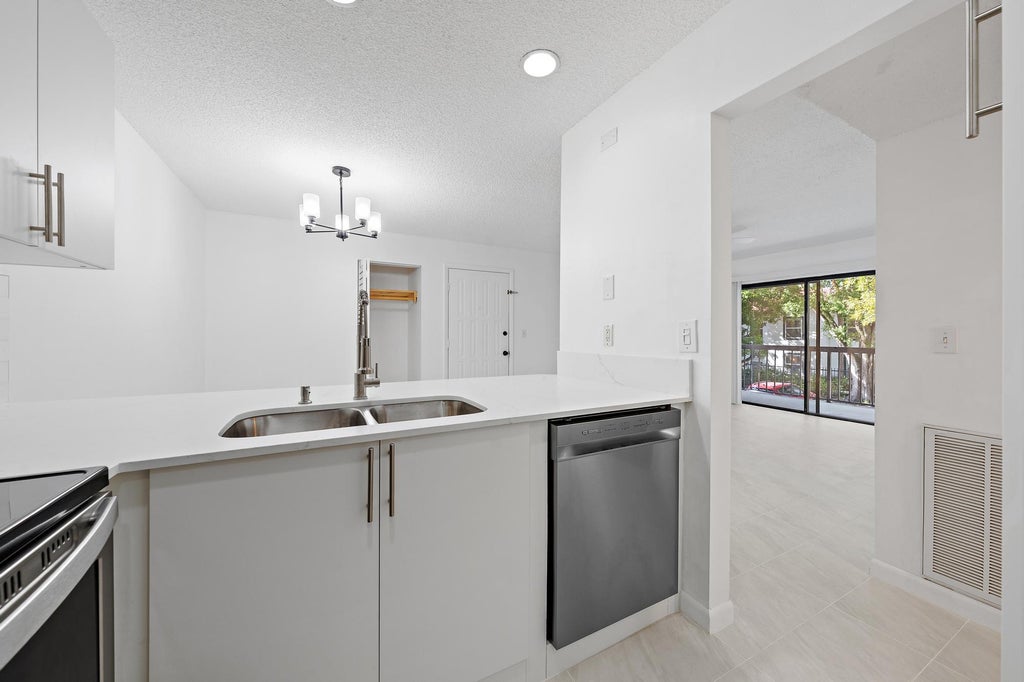 Photo of 3402 Gardens E Drive, Palm Beach Gardens, FL 33410 (MLS # B26088240)
