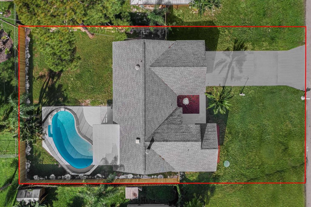 Photo of 374 NE Greenbriar Avenue, Port Saint Lucie, FL 34983 (MLS # R11059416)