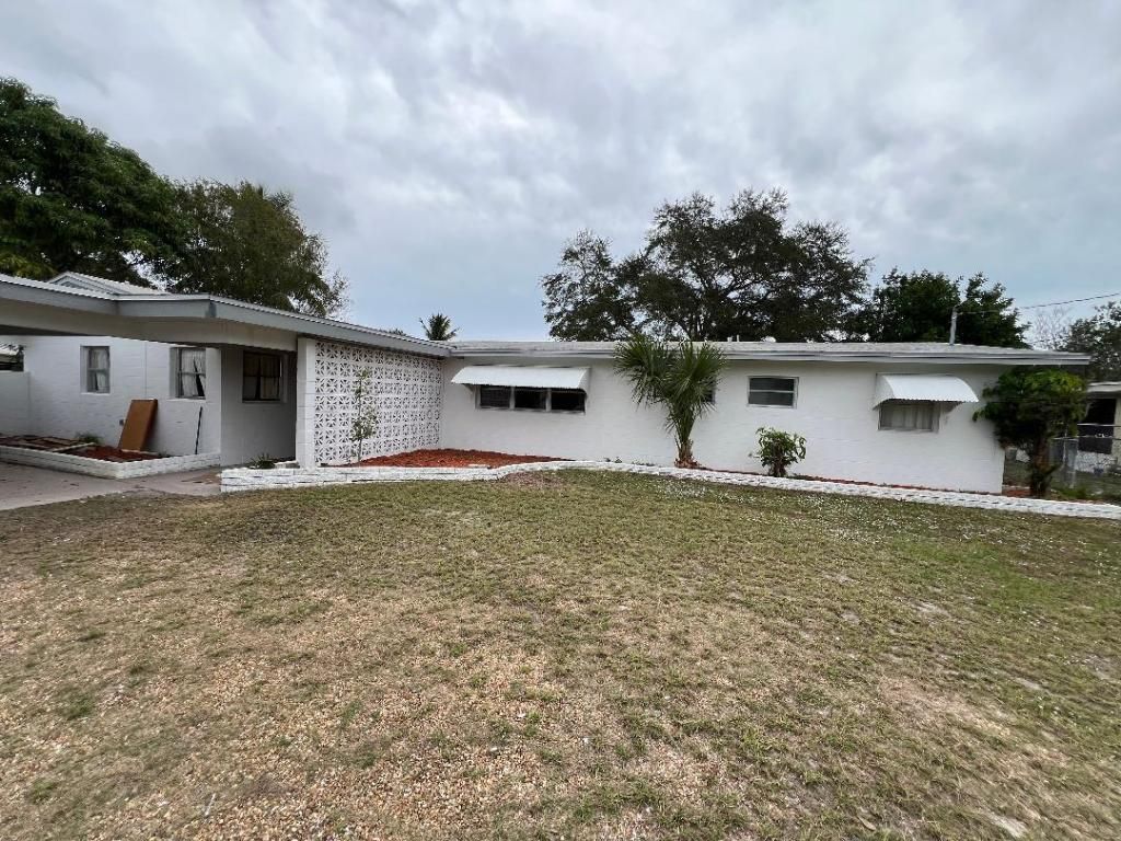 Photo of 1908 Colonial Road, Fort Pierce, FL 34950 (MLS # R11156932)