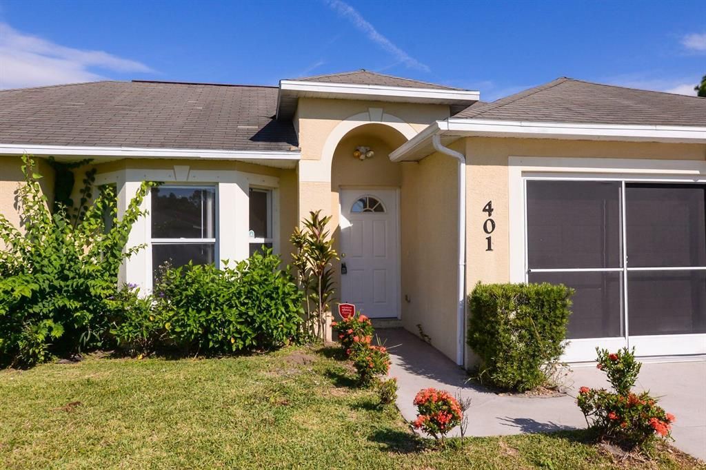 Photo of 401 SW Buxton Avenue, Port Saint Lucie, FL 34983 (MLS # R10756235)