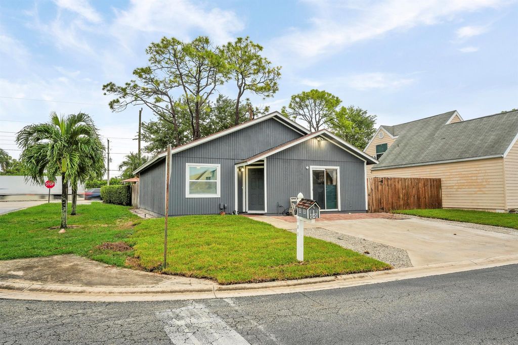 Photo of 4181 Willowood Lane, Lake Worth, FL 33462 (MLS # R11122200)