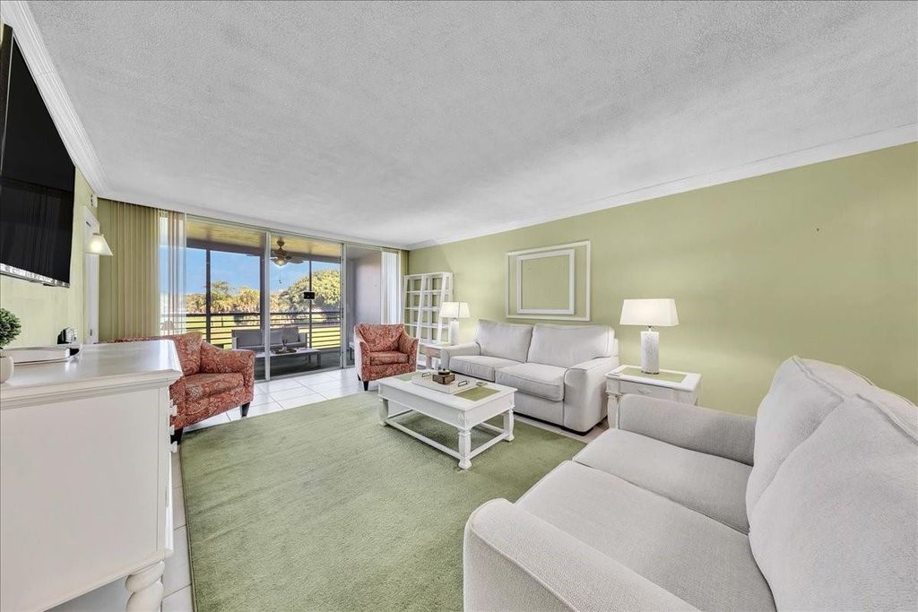 Photo of 2651 S Course Drive #302, Pompano Beach, FL 33069 (MLS # F10555383)