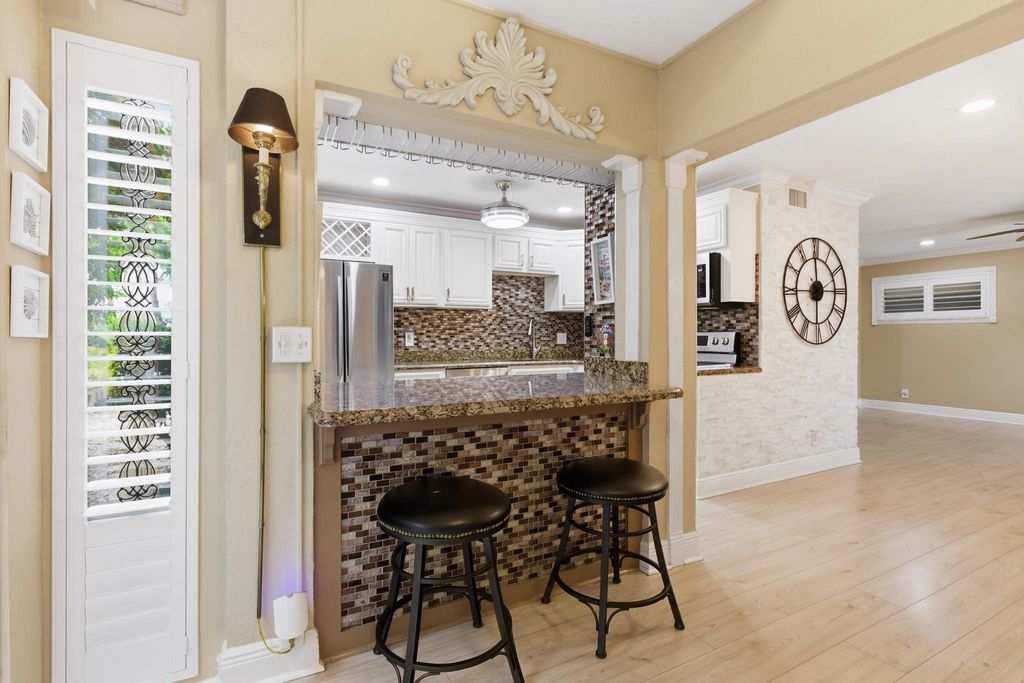 Photo of 34 Colonial Club Drive #101, Boynton Beach, FL 33435 (MLS # B26035510)
