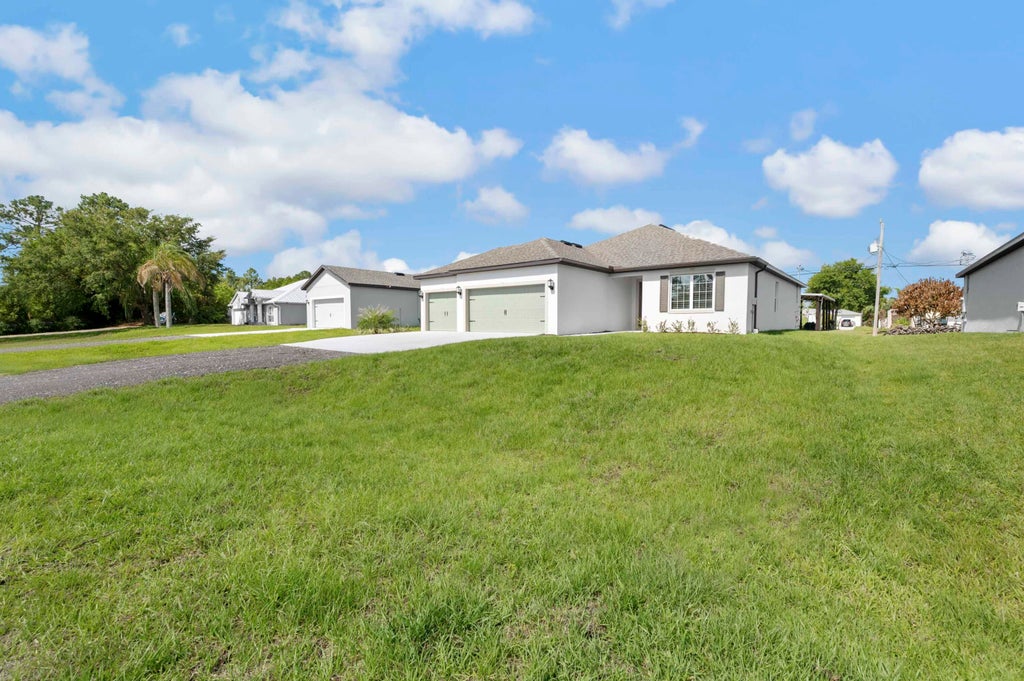 Photo of 7745 94TH Avenue, Vero Beach, FL 32967 (MLS # B26079686)