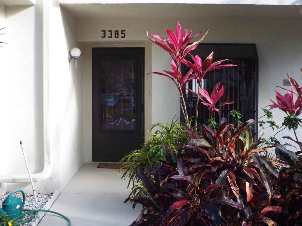 This is a 2 Bedroom 2 Bathroom 1st Floor Unit In 55+ Community. It Is Bright & Airy . The Unit Has Brand New Ceramic Tile Flooring In Living Area & Master Bedroom , 2nd Bedroom is Carpeted. Freshly Painted In Linen White , New Fans & Lighting Fixtures .Pristine Condition .This Unit Has A Large Master Suite , Updated Shower Stall, Lots Of Closets, Full Size Kitchen With Garden Window. Enjoy The View Overlooking The Lake In Your Completely Screened In Patio. The Unit Is Also Equipped With Accordion Shutters . This Quaint Little Development Offers Lot's of Amenities Including A Resort Style Heated Pool, 3 Tennis Ct's , Sauna, Pool Table, Clubhouse With Entertainment , Bocce Ball, Shuffleboard , Nice Walking & Biking Pathways. Close To All Major Roadways, PBI Airport Just Minuets Away