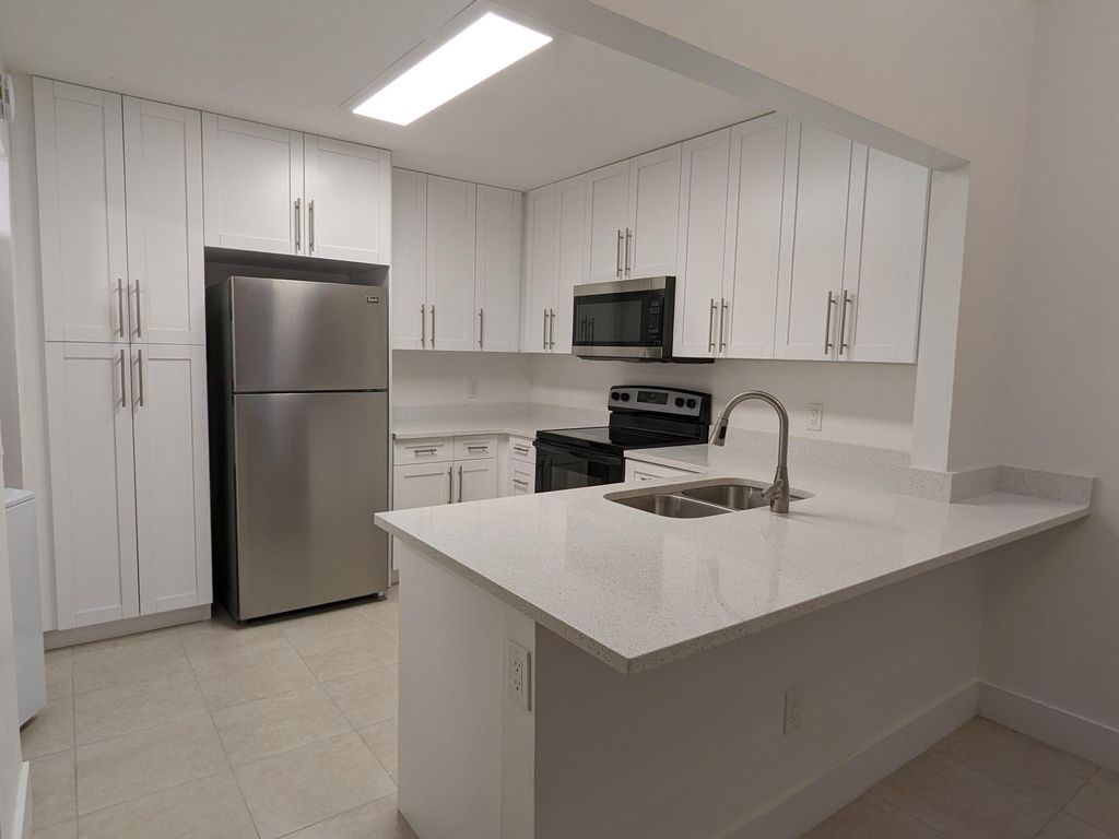 Photo of 4144 Palm Bay Circle #C, West Palm Beach, FL 33404 (MLS # R10971304)