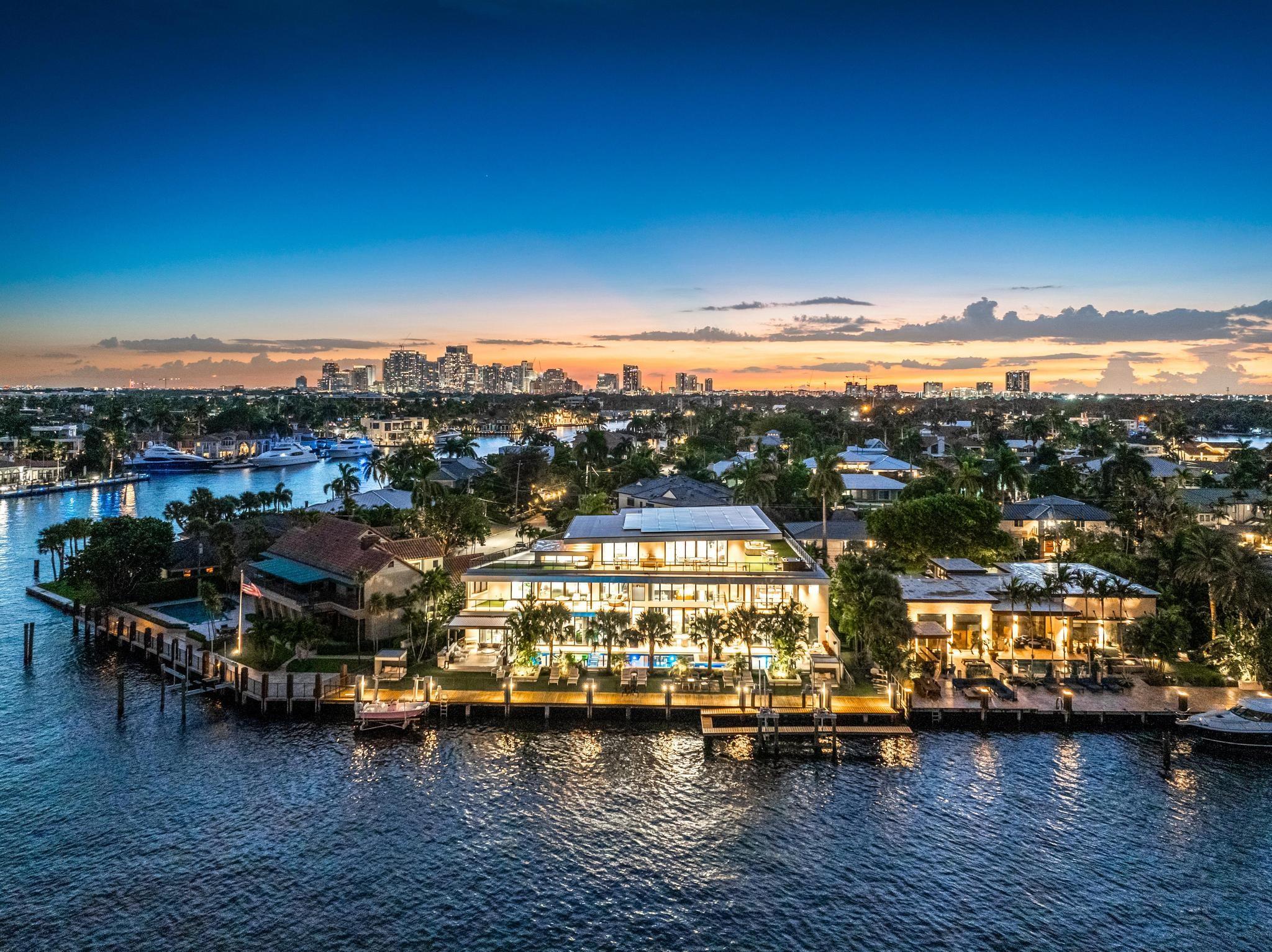 OWNER FINANCING POSSIBLE! PERFECT 10! HAS IT ALL. NO COMPROMISING! MESMERIZING Panoramic water &
skyline views, 140’+ dock, lift, 10+!water depth, no wake zone, quick ocean access, modern, 2022 like new, 3-story masterpiece, garage storage 4-8 cars, every amenity you imagine. Professional gym, kitchen for a chef, kitchen-bar opens to great room, kitchen-bar on third level. OVER THE TOP MASTER SUITE, 2 spacious closets & 2 baths, 6 bedrooms, office/“man-cave” with glass wall garage. Solar equipped. Perfect for family resort at home or elegant entertaining. Sunrise Key is gated island all-waterfront community. Minutes to Las Olas and beaches. Close to best schools. Ask for website with more details. 12,423 sf includes garages per BCPA