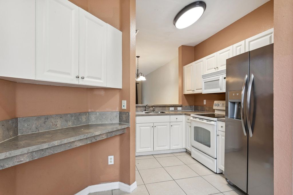 Photo of 1950 Alamanda Way, Riviera Beach, FL 33404 (MLS # R10941274)