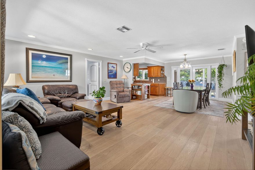 ROCKY POINT -Beautiful 3 bedrooms / 3 full bathrooms w/1 car garage on this 1/4 acre fully fenced in yard featuring BRAND NEW 2025 Metal Roof, 2022 Hurricane Impact Windows & Doors, 2022 Generac Whole House Generator & Propane Tank, 2022 Solar Panels & Newer A/C!!!  Wood Flooring Throughout.  Nice Galley Kitchen w/stainless appliances, oak cabinets w/soft close doors & pull outs, Double Stainless Sink & Breakfast Nook.  Open Floor Plan Great Room w/French Doors & Crown Moldings.  Main Bedroom has walk-in closet.  Updated Bathrooms.  Dining Area and Enclosed Florida Room w/ lots of windows looking out into the large backyard.  Enjoy the Florida weather under the two Gazebos and Fire Pit.  New Double Side Entry Gate.  Plenty of room for you Boat/RV.  Bring your toys! NO HOA!!  A MUST SEE!!! Enjoy the community of Rocky Point with Twin Rivers Park and the many nature preserves with walking trails.  Fantastic Restaurants nearby!  Close to the Beaches and Inlet with Sandsprit Boat Ramp just a few blocks away!
