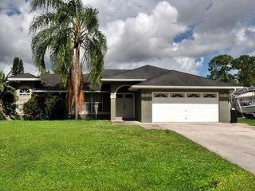 Photo of 253 SE Todd Avenue, Port Saint Lucie, FL 34983 (MLS # R10759700)