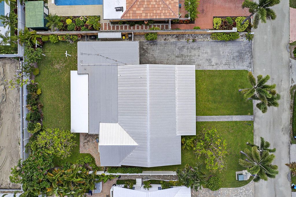 Photo of 310 Tacoma Lane, Palm Beach Shores, FL 33404 (MLS # R11106789)