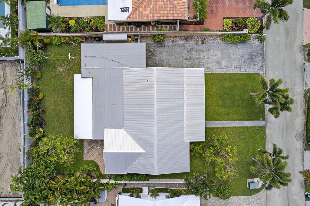 Photo of 310 Tacoma Lane, Palm Beach Shores, FL 33404 (MLS # R11106789)