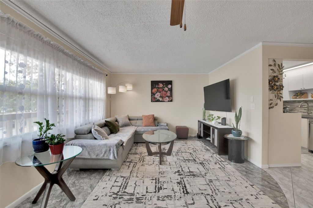 Photo of 4302 Martinique Circle #E2, Coconut Creek, FL 33066 (MLS # B26018703)