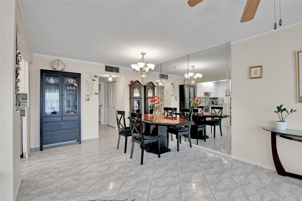 Photo of 4302 Martinique Circle #E2, Coconut Creek, FL 33066 (MLS # B26018703)