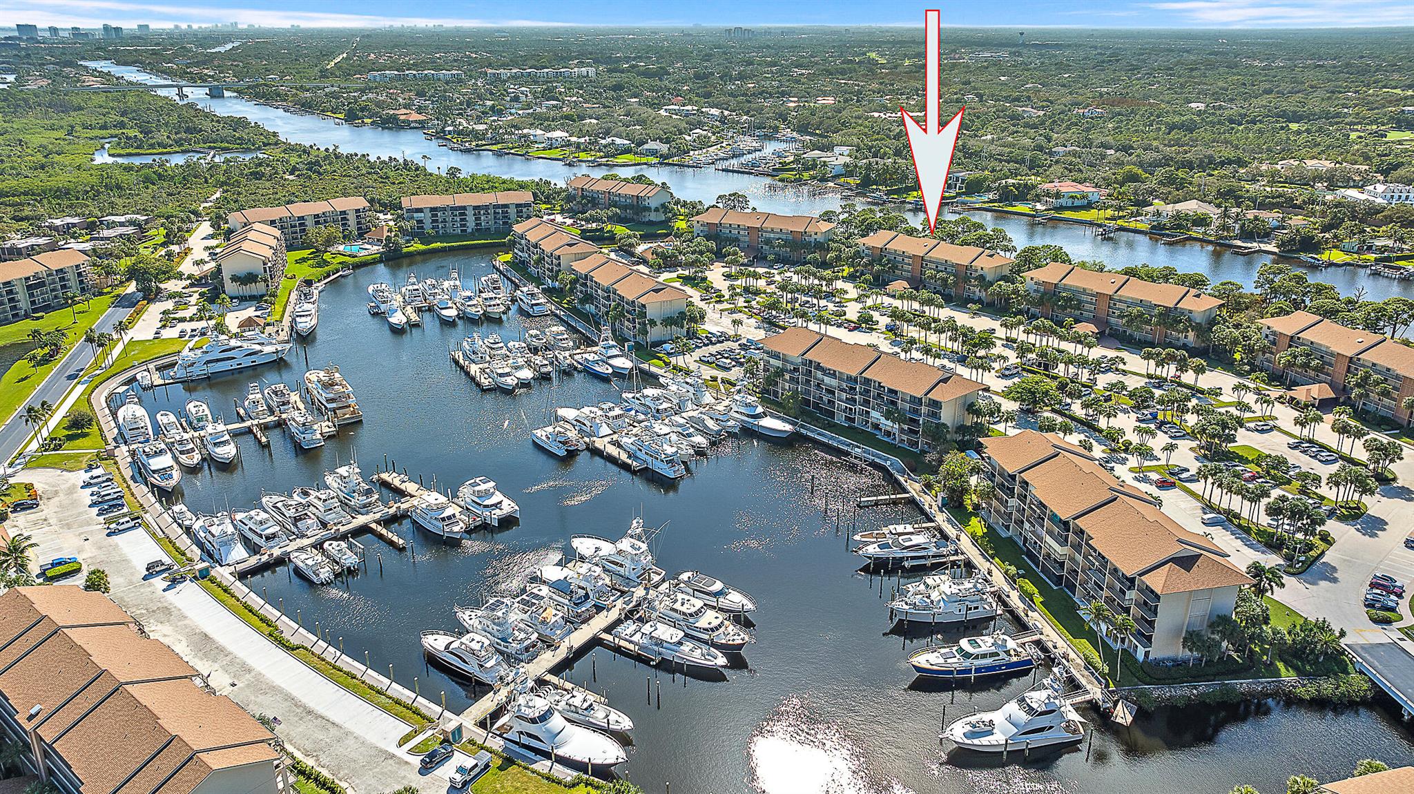 Soak in sweeping Intracoastal views by day and vibrant sunsets by night--right from your private balcony! This beautifully renovated waterfront condo offers a prime opportunity to live the Jupiter lifestyle. Enjoy a fully updated kitchen featuring quartz countertops, custom cabinetry, and new appliances. Bathrooms have been tastefully remodeled, and you'll love the added touches throughout--crown molding, built-in office space, and a brand-new washer and dryer.Just steps from your front door, relax at the pool while watching yachts glide into the marina. Marina at the Bluffs offers resort-style living with pickleball, tennis, four pools with clubhouses, bocce, BBQ areas, and a full-service marina with dock master.