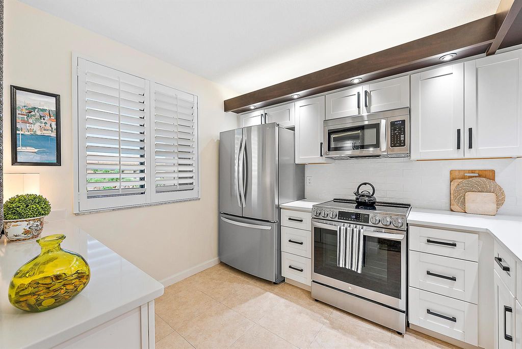 Photo of 2101 Marina Isle Way #404, Jupiter, FL 33477 (MLS # R11106093)
