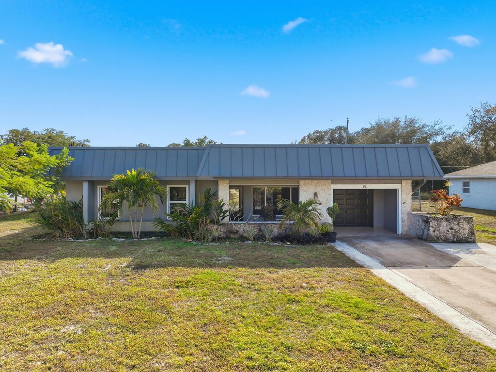 Photo of 898 SE Evergreen Terrace, Port Saint Lucie, FL 34983 (MLS # R11153078)