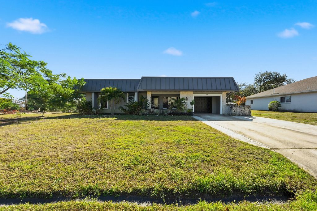 Photo of 898 SE Evergreen Terrace, Port Saint Lucie, FL 34983 (MLS # R11153078)