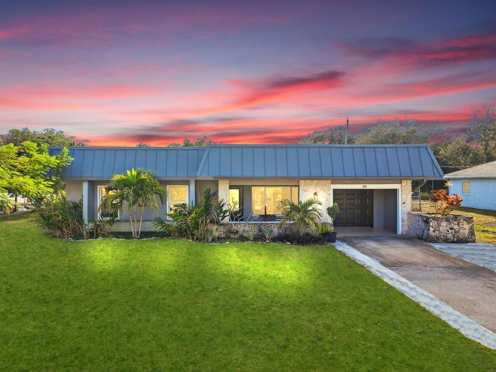 Photo of 898 SE Evergreen Terrace, Port Saint Lucie, FL 34983 (MLS # R11153078)