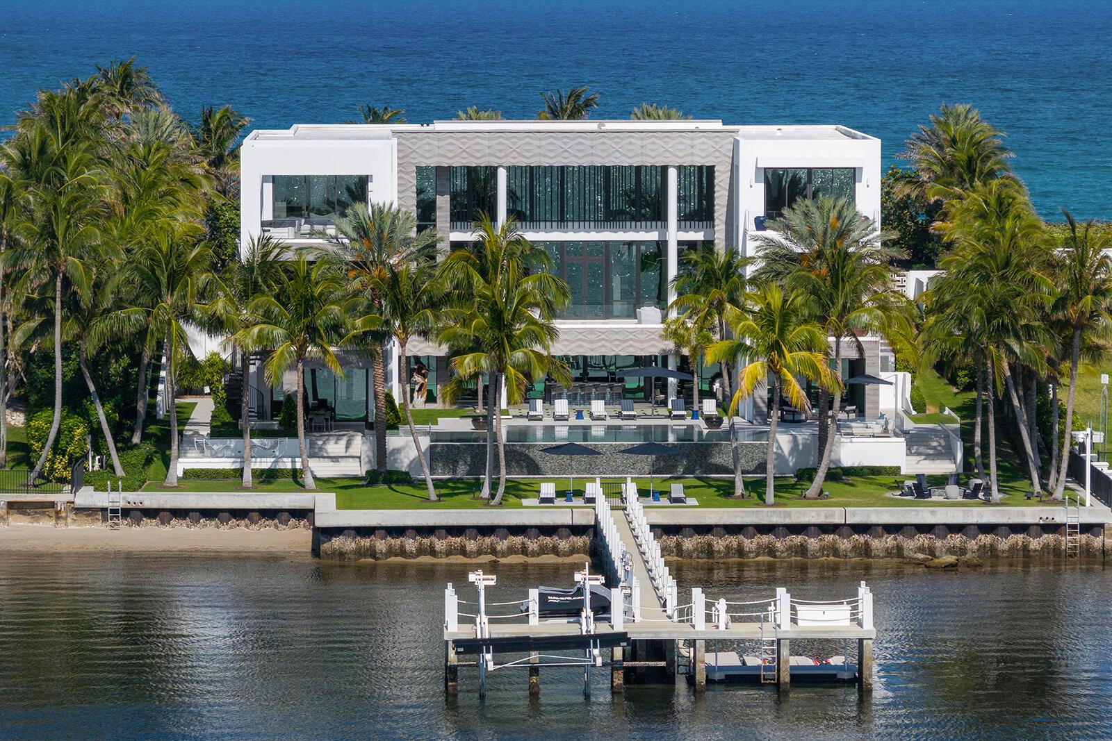 1940 South Ocean Blvd, Manalapan, FL 33462 - An Estate That Captures The Grandeur And Sophistication Of The World's Finest Luxury Hotel. Offered For The First Time, A Three Story 23K SqFt One-Of-A-Kind, Custom Built, Contemporary Seaside Masterpiece Stands Majestically Overlooking Nearly Two Acres Of The Florida Intracoastal Waterway And The Powdered Sand Shores Of Manalapan's Atlantic Ocean - Home To The Uber-Wealthy And Just South Of Americas Winter White House, ''Mar-A-Lago''. This Property Has Been Crafted From The Finest, Most Luxurious Resources, Fabrics, Stones And Natural Materials Available: Tunnel To Private Beachfront Cabana, Private Dock, Two Bowling Allies, Wellness Spa, Steam Room, Massage Room, Fitness Center, Movie Theater, Game Room, Craft Room, Elevator, Scullery Kitchen